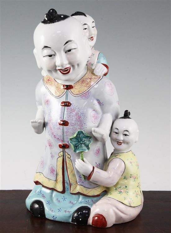 A Chinese enamelled porcelain group of boys, 20th century, 31cm